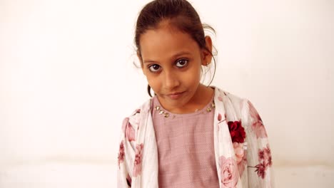 portrait of an indian child at home during coronavirus lockdown