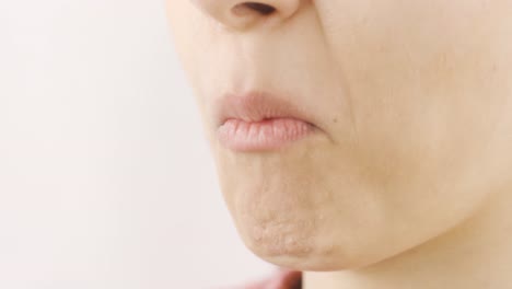 woman eating dried cherries in close-up. dry fruits.