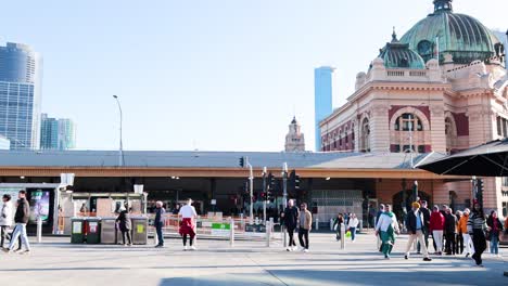 people bustling outside iconic melbourne railway station