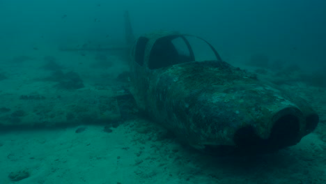 airplane wreck underwater on ocean floor