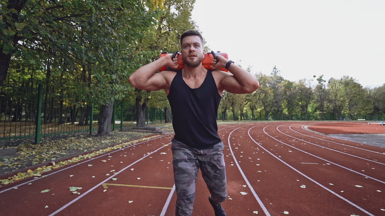 Young man doing workout. Man doing fitness workout outdoors