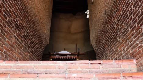 ascending brick stairs to a temple altar