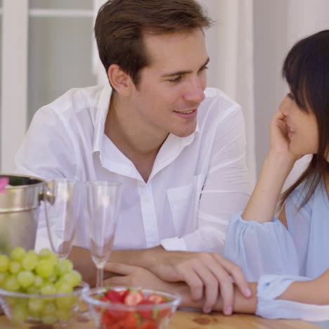 Attractive-mixed-couple-having-wine-together