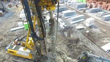 aerial shot of the drilling rig boring hole in soil at construction site