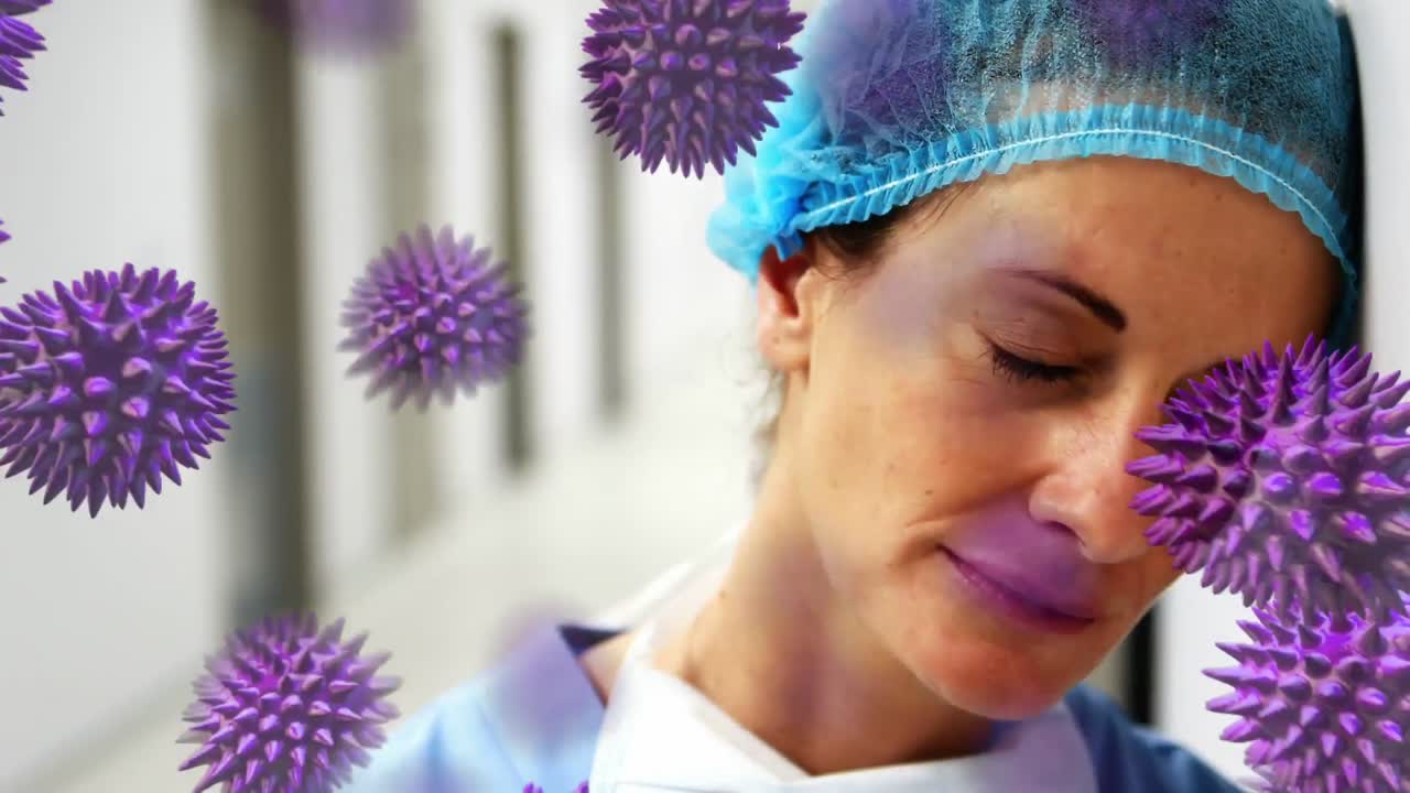 animación de la propagación del coronavirus covid19 con un trabajador de la salud en el fondo
