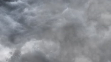 background of dark ominous grey storm clouds
