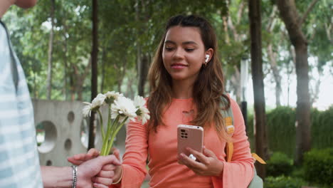 girl receiving flower bouquet