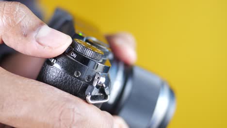 a men is taking pictures on a camera