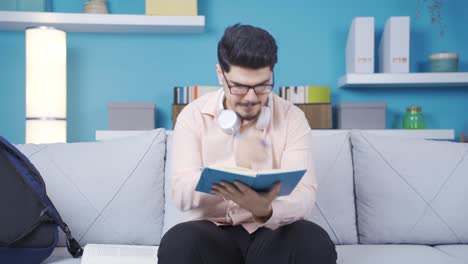 clever male student comes home studying.