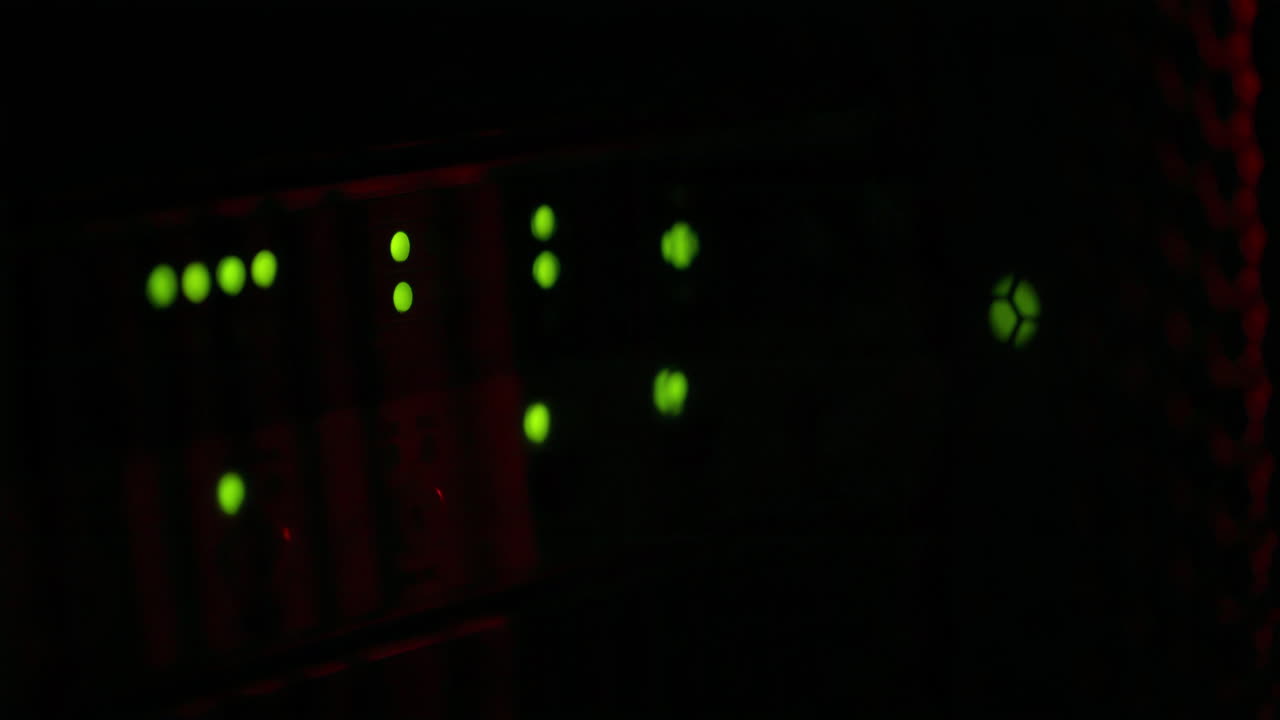 Close up of a server with flashing red lights in a data center