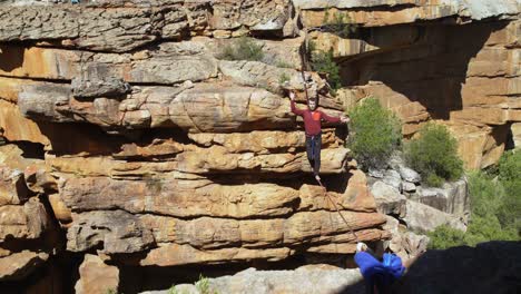 Highline-athlete-walking-on-slackline-4k