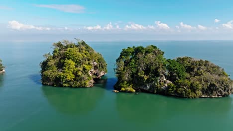 karst islets in crystal clear waters of los haitises national park, dominican republic