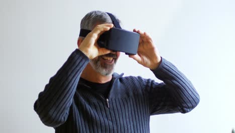 man using virtual reality headset at home 4k