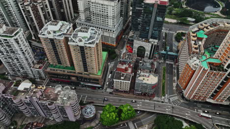 an aerial view of a city with tall buildings
