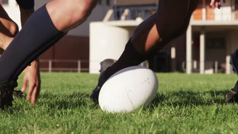 rugby players having match on the field