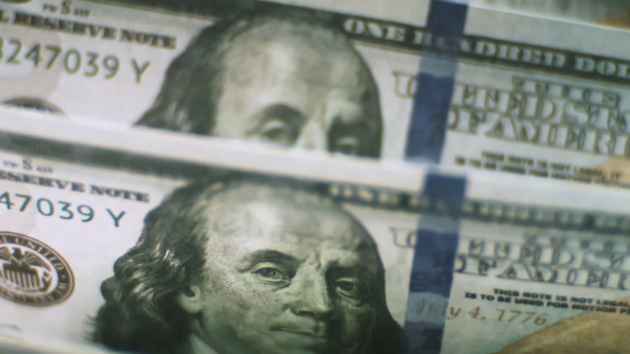 nos apilaron billetes de un dólar