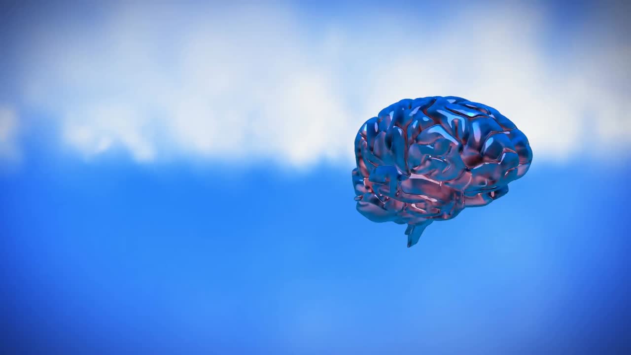 Spinning iron brain on a sky background