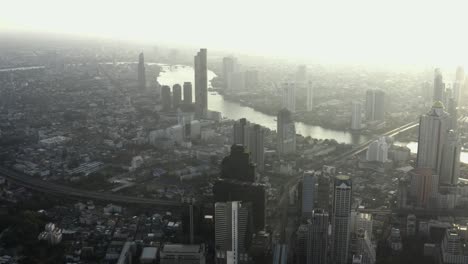 beautiful sunrise over the bangkok city, thailand compose of unique buildings and establishments.- aerial shot