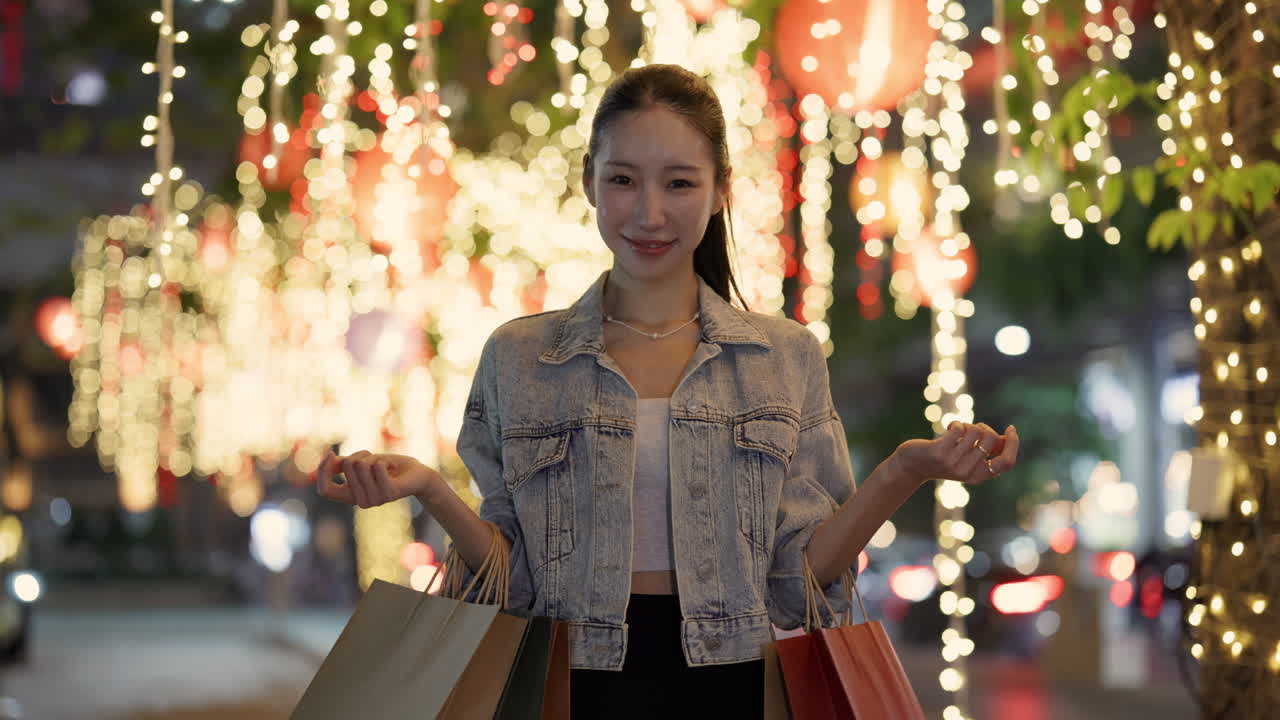 Woman with Shopping Bags at Night