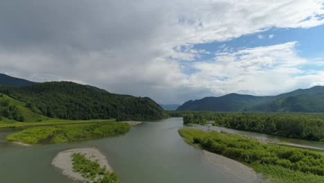 aerial view of a river winding through mountains