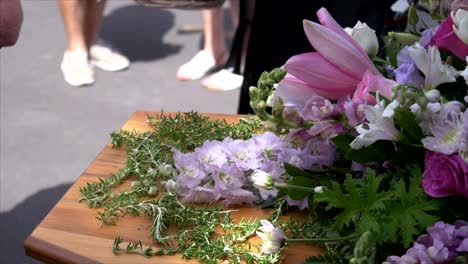 closeup shot of a funeral casket in a hearse or chapel or burial at cemetery