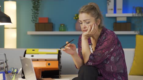 home office worker woman has trouble focusing.