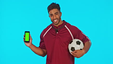 Soccer-man,-green-screen-and-phone-in-studio