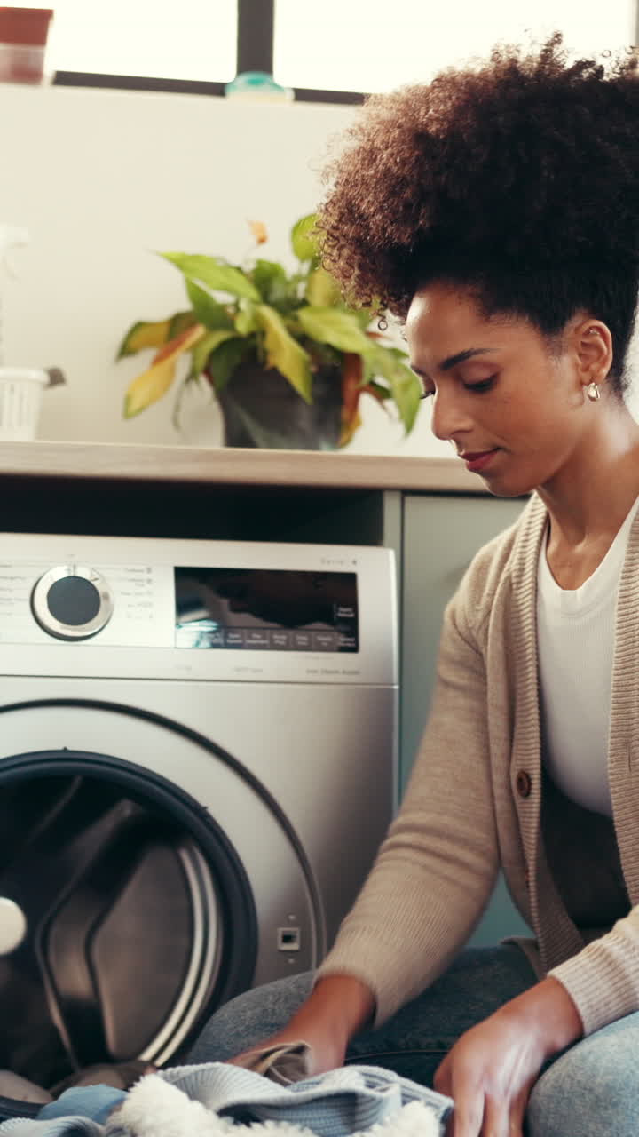Woman doing laundry at home