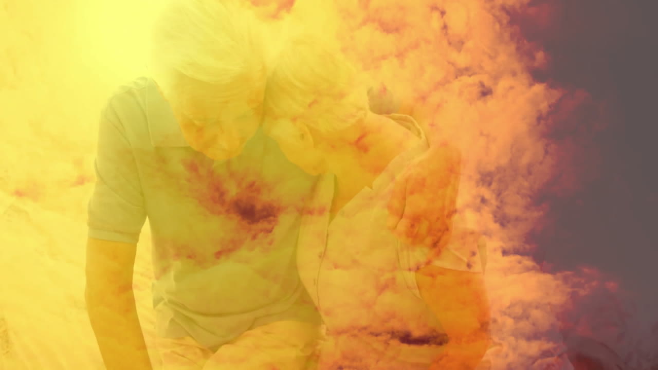 Embracing elderly couple with vibrant yellow and orange animation overlay