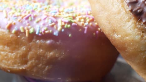 Delicious-glaze-donut-homemade-tasty-sprinkles-frosted-toppings-sweet-food-close-up