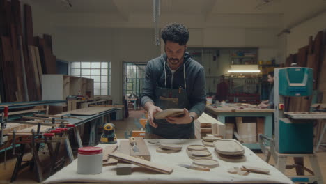 woodworker making serving trays in woodshop
