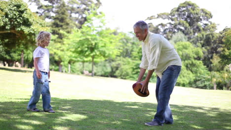 boy playing with his grandfather