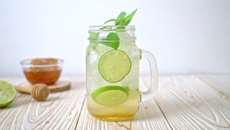 iced honey and lime soda with mint - refreshing drink