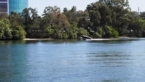 a boat travels along a scenic canal