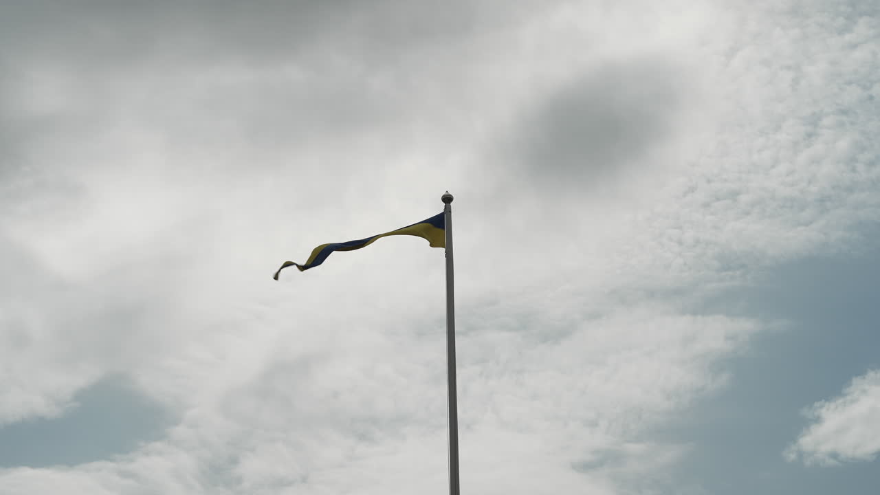 Flag waving in the wind in Stockholm Sweden