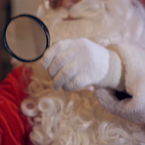 santa claus holding letter