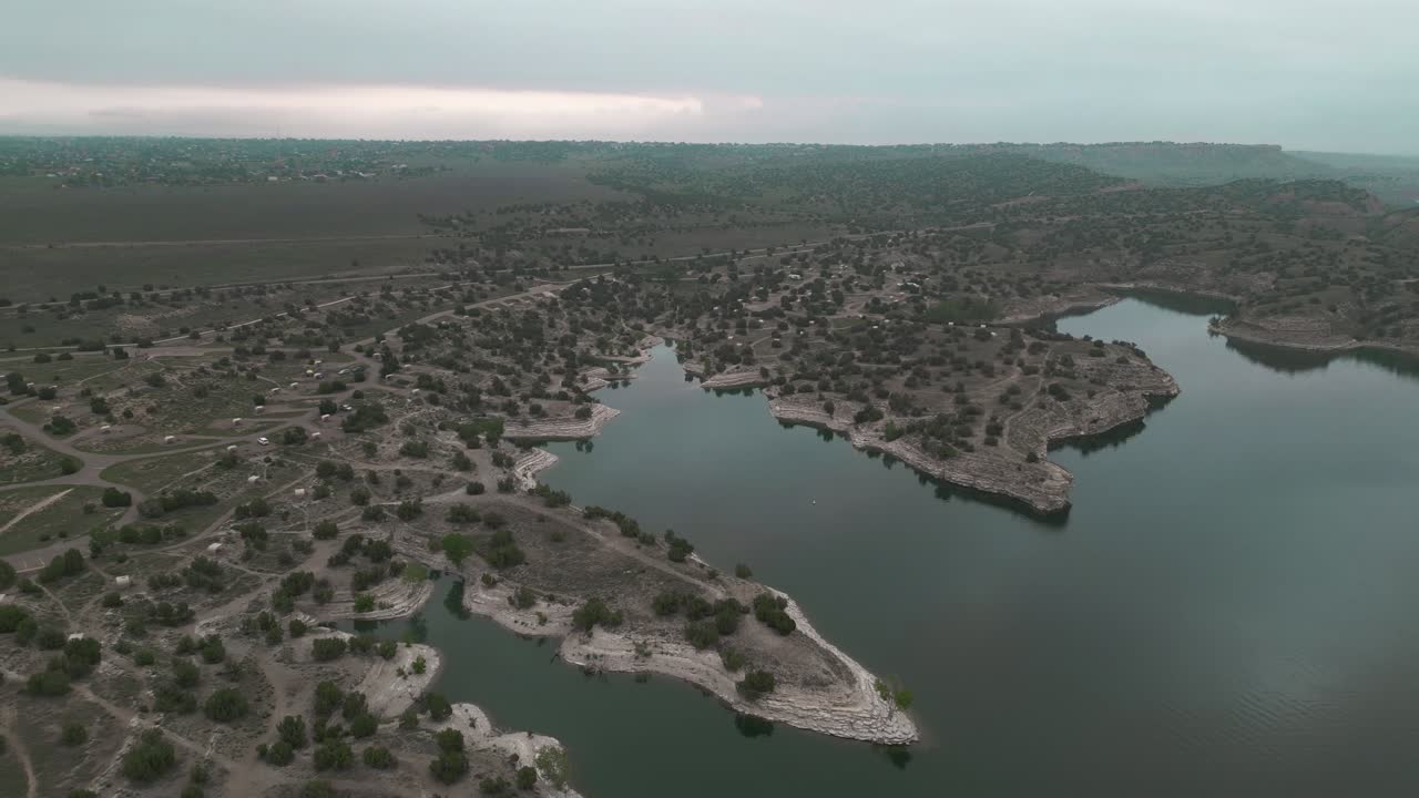 dolly pull-out cinematic view revealing the massive water reservoir of colorados pueblo