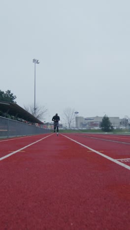 man running on a track