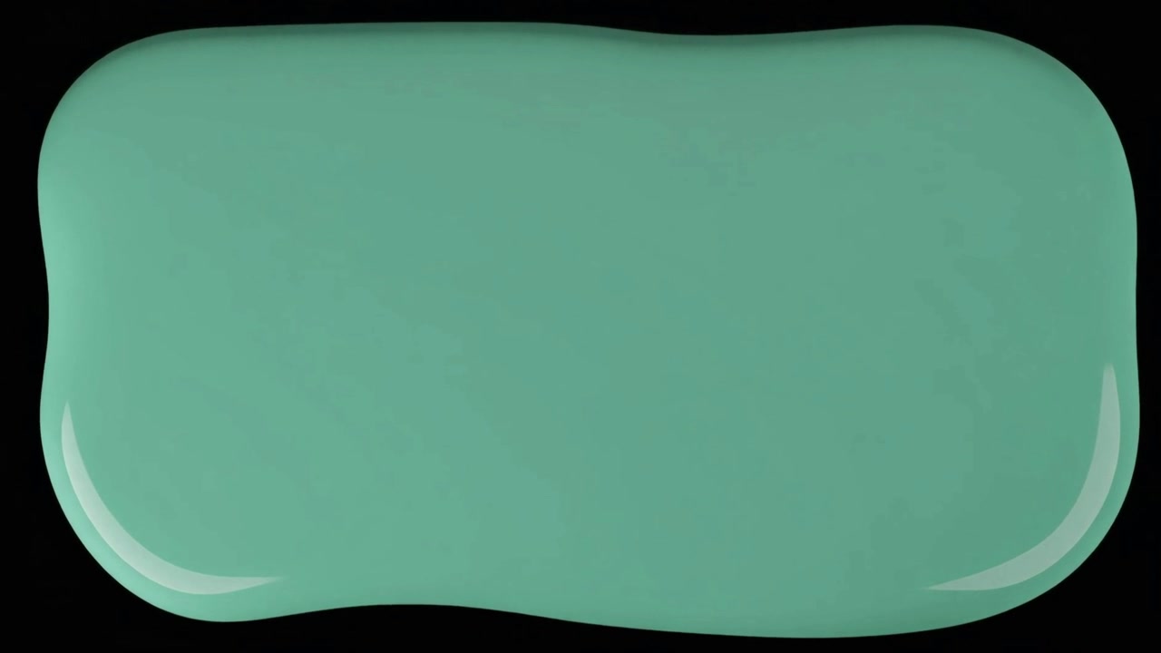 Schizzo di vernice verde che si diffonde su sfondo nero