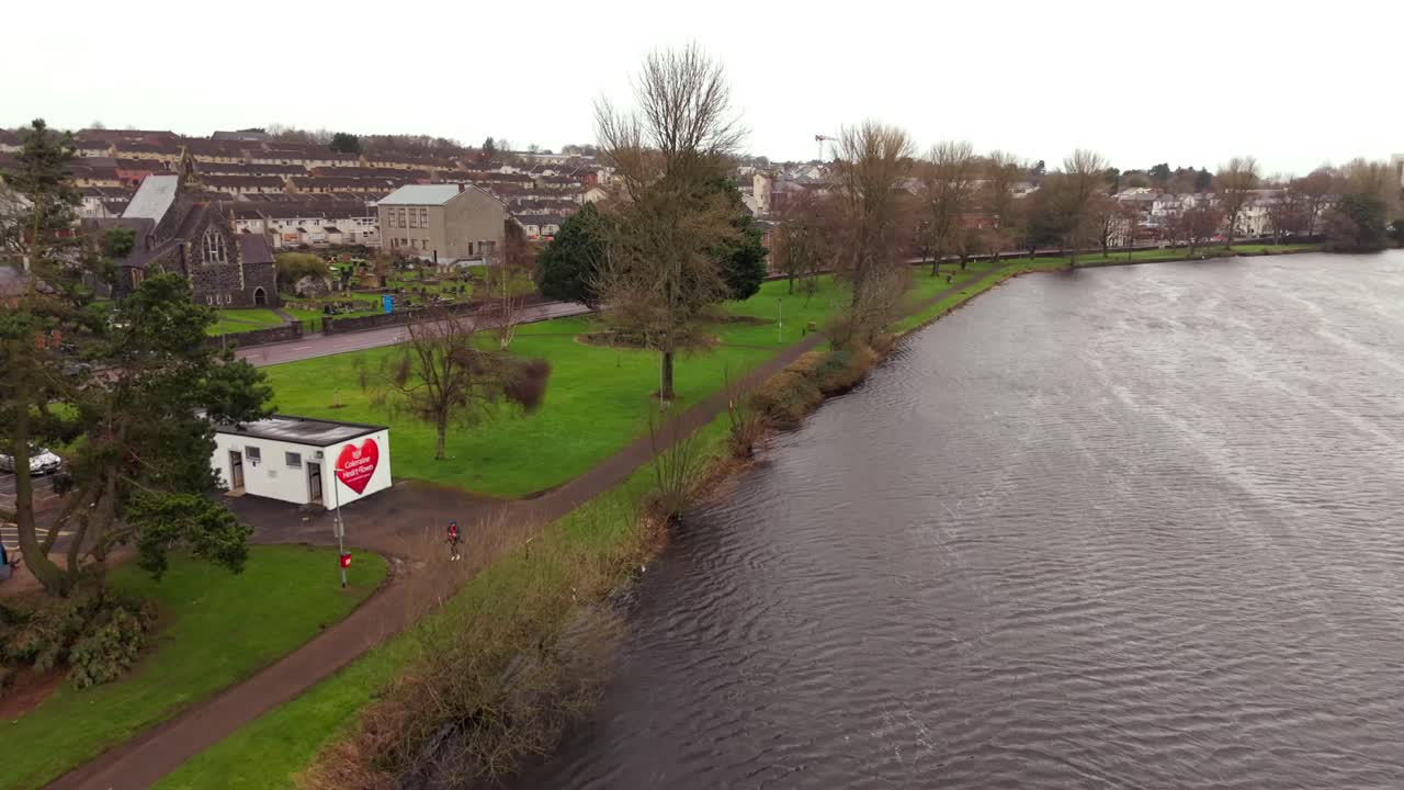 Slow reversing aerial video of Coleraine in Northern Ireland in the UK. Taking in the River Bann, the video is produced in 4K, 60FPS and with Rec709 color