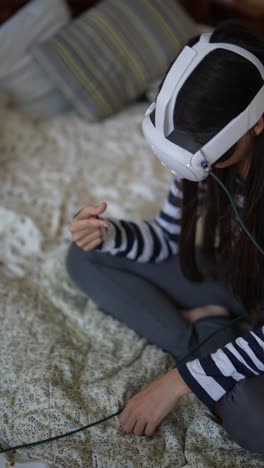 woman using vr headset on bed