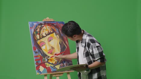 person painting a portrait