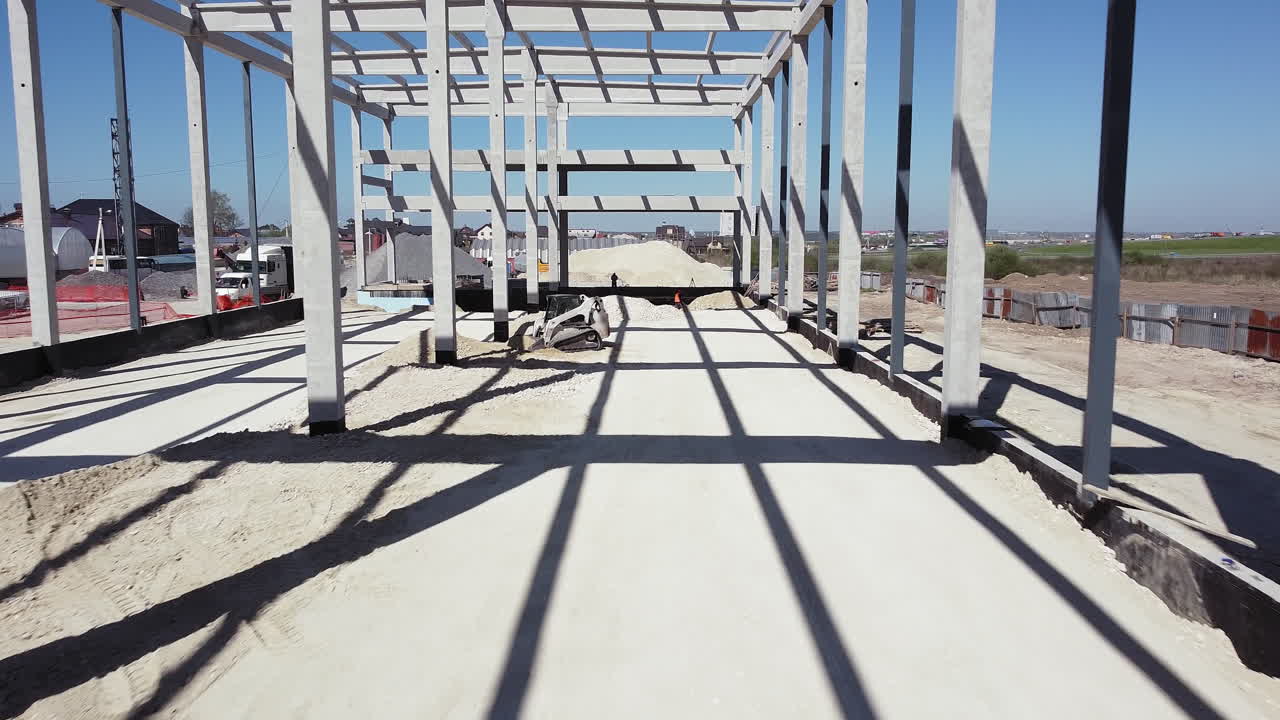 Construction Site with Bulldozer and Workers