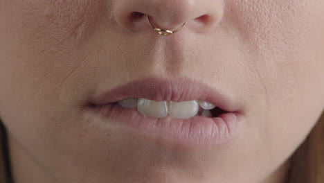 close up caucasian woman mouth biting lips sensual flirty female