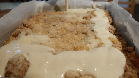 lasagne assembly, adding bechamel sauce