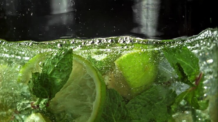 Sparkling Mojito Cocktail with Fresh Lime and Mint Leaves