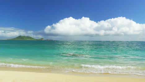 tropical beach paradise with turquoise water and clouds