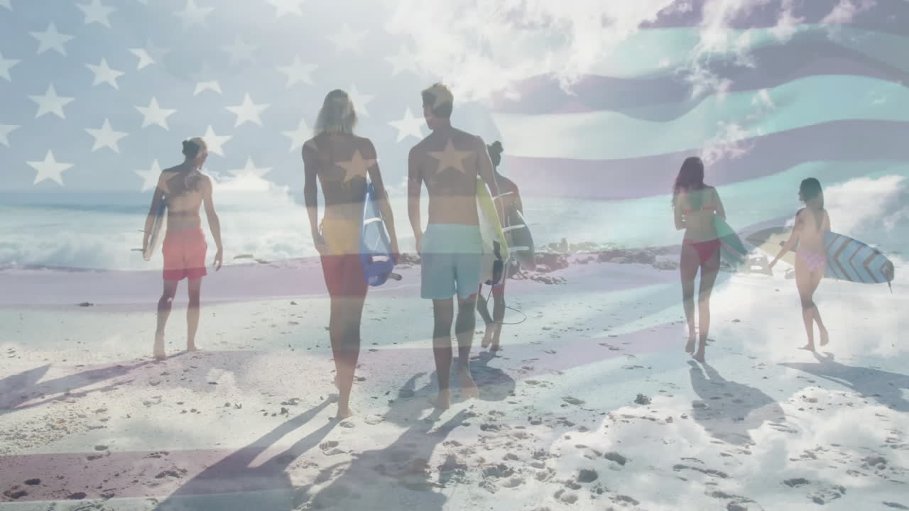 animación de la bandera de los ee.uu. sobre diversas personas con tablas de surf en la playa