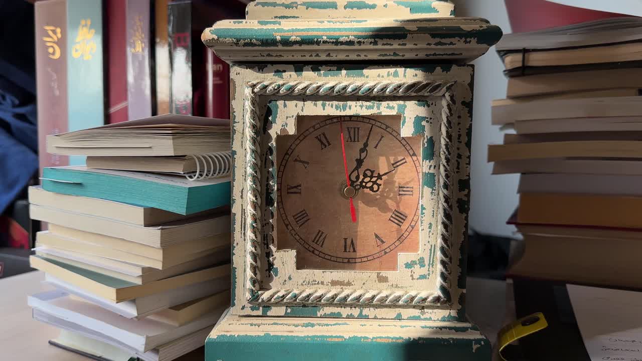Vintage wooden clock ticking Antique timepiece close-up in bedroom interior Retro nostalgia lifestyle morning light Slow-moving second hand Classical design library furniture household object indoors