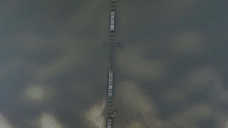 beach pier were damaged by a hurricane that brought strong winds and heavy rain from the gulf coast to the mid-atlantic. aerial video of land in the south mississippi region after hurricane zeta